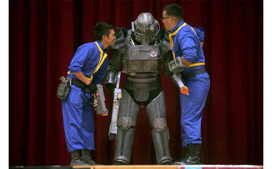 Cosplayers on stage at Comic Con Okinawa