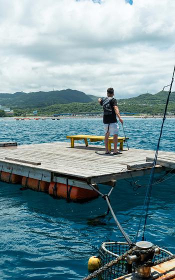 a man on fishing raft
