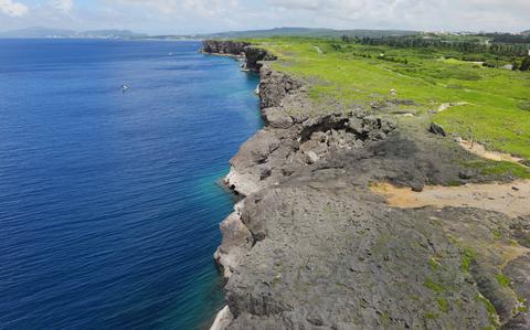 Photo Of Cape Zanpa and the sea.